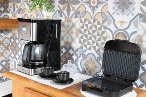 Kemudahan buat kopi dan teh di Refugio Vale da Mantiqueira Visconde de Mauá