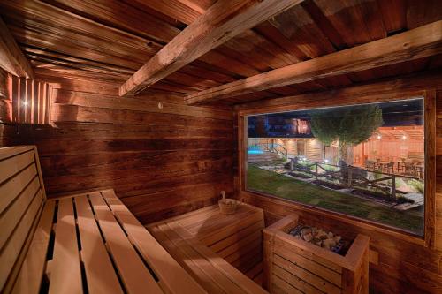 TV a/nebo společenská místnost v ubytování Apartments & Wellness Löfflerblick