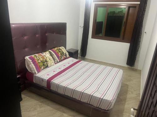 Postel nebo postele na pokoji v ubytování Apartamento familiar cerca del mar, Martil