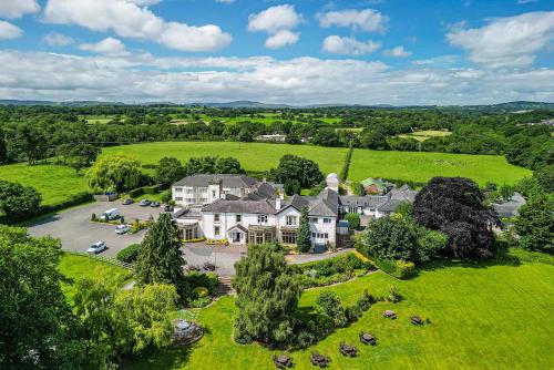 an aerial view of a large house in a field at Northop Hall Country House Hotel in Mold