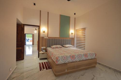 Ένα ή περισσότερα κρεβάτια σε δωμάτιο στο Casa Bella - The Group Stay
