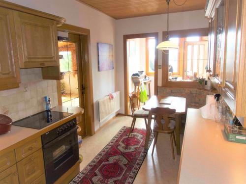 Kuchyň nebo kuchyňský kout v ubytování Holiday Home Seeboden near Ski & Lake Views