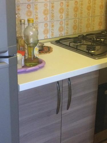a kitchen with a stove and a counter top at casa di Borgio Verezzi in Borgio Verezzi