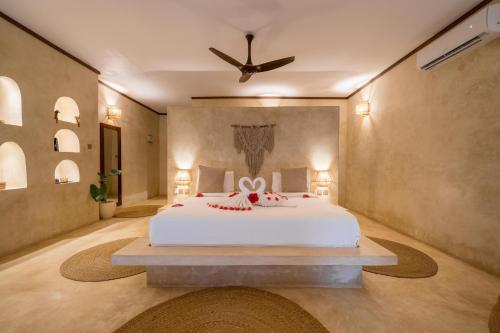 Letto o letti in una camera di Safaya Luxury Villas - Adults only