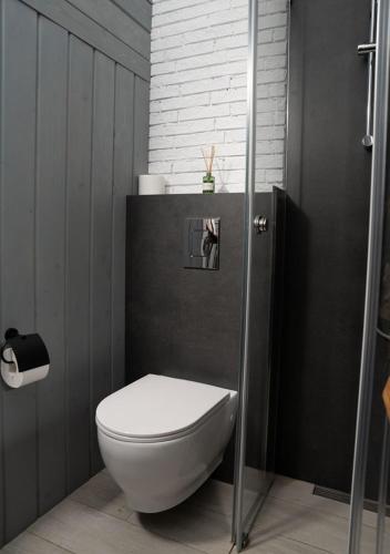 a bathroom with a toilet and a shower at Shakaryan Rancho&Restaurant in Dsegh