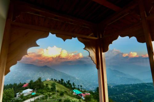 a view from a window of a mountain view at Echoes of Nirvana in Theog