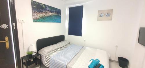Postel nebo postele na pokoji v ubytování Habitaciones Céntricas en Vivienda Compartida