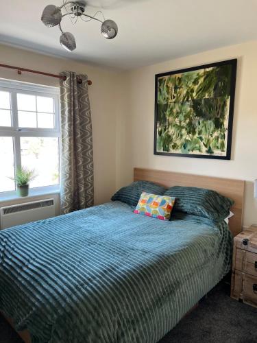 Ένα ή περισσότερα κρεβάτια σε δωμάτιο στο 2 Bed Modern Apartment