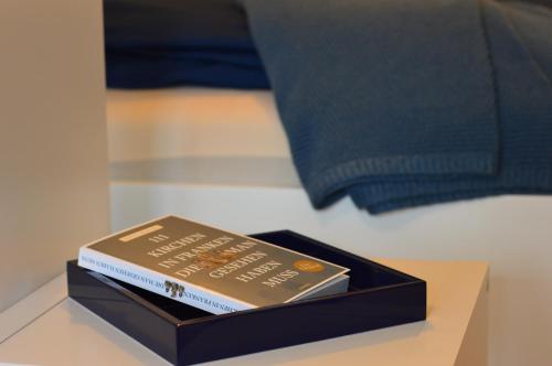 a book sitting on top of a table at Ferienwohnung Am Hunnenbrunnen in Güntersleben