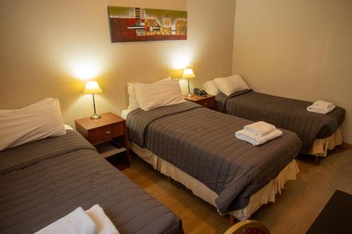 Postel nebo postele na pokoji v ubytování Hotel Aspen Ski by bund