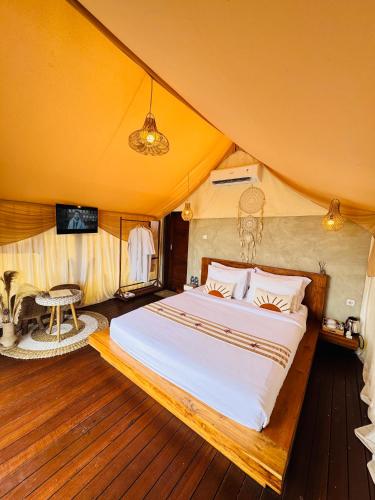 Katil atau katil-katil dalam bilik di Pinggan luxury camp