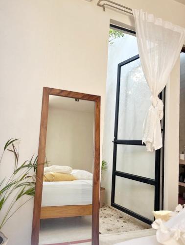 Кровать или кровати в номере Casa Tuch. Suites independientes de diseño. Retiro de lujo, oasis de paz.