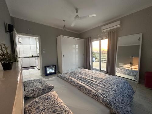 Ένα ή περισσότερα κρεβάτια σε δωμάτιο στο Nile Spirit View