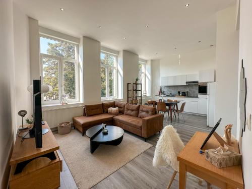 Kuchyň nebo kuchyňský kout v ubytování Élégant appartement