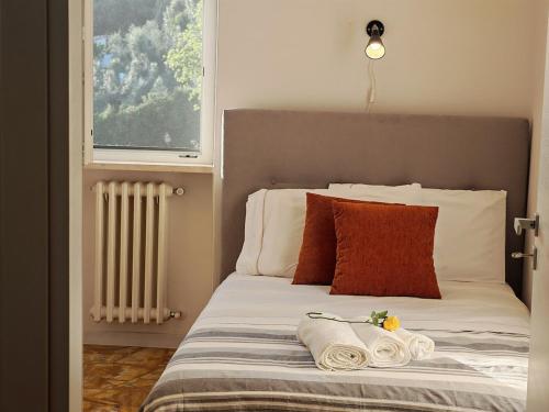 Ένα ή περισσότερα κρεβάτια σε δωμάτιο στο Villa Oreste