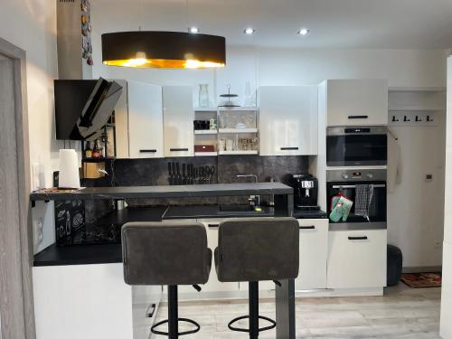 Kuchyň nebo kuchyňský kout v ubytování Apartmán SIA Garážové parkovanie