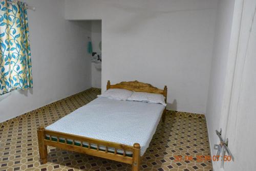 Postel nebo postele na pokoji v ubytování Jungle View Homestay Anakulam