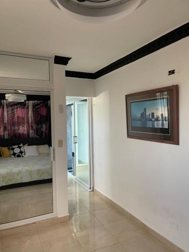 Ένα ή περισσότερα κρεβάτια σε δωμάτιο στο Bella casa en lo alto