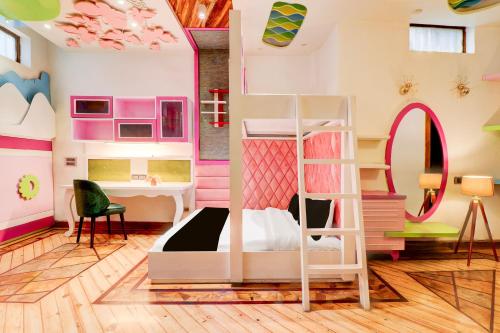 Postel nebo postele na pokoji v ubytování Hotel O Siris Luxury Cottage Amatra Dunsvirk Court