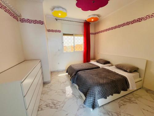 Ένα ή περισσότερα κρεβάτια σε δωμάτιο στο Luxe appartement villa Grand terrasse
