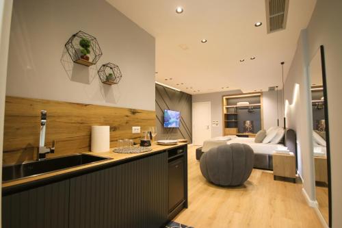Llit o llits en una habitació de Fra Suites