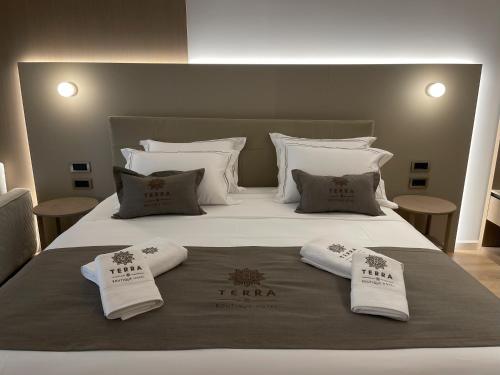 Katil atau katil-katil dalam bilik di Terra Boutique Hotel