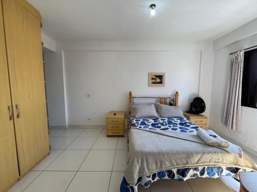 Ένα ή περισσότερα κρεβάτια σε δωμάτιο στο SMART FLAT HOTEL apartamento 11A CENTRO
