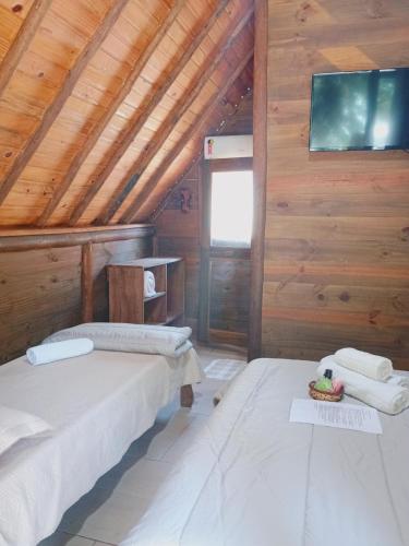 Postel nebo postele na pokoji v ubytování Chalés do Pedro Hospedagem e Restaurante
