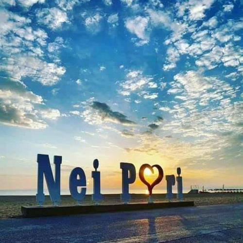 a sign that says natalie with a heart on the beach at Tommys Apartment in Nei Poroi