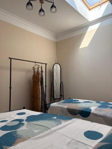 Ένα ή περισσότερα κρεβάτια σε δωμάτιο στο Ideally located spacious 3 bedroom house