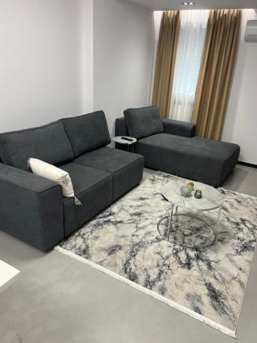 Posezení v ubytování Daors Family Apartments