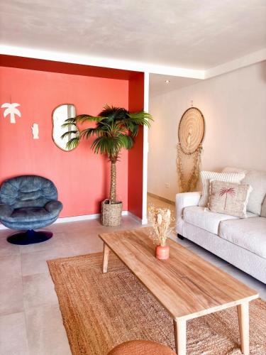 a living room with a couch and a coffee table at Casa Soleil Vibrant Caribbean Hideaway, Perfect for families & friends in Cul de Sac