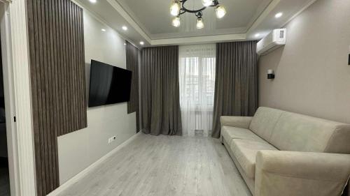 TV a/nebo společenská místnost v ubytování Lux house