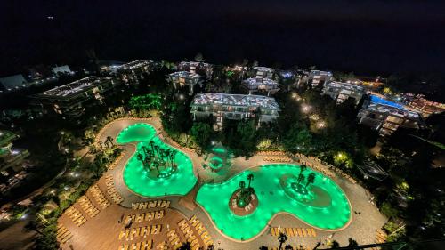 an aerial view of a resort at night at Luxury Dreamland Oasis Apartments in Chakvi