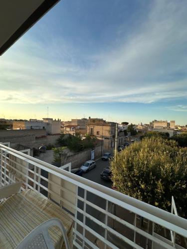 a balcony with a view of a city at "La casa di Mariagrazia" Appartamento 4 locali in Sammichele di Bari