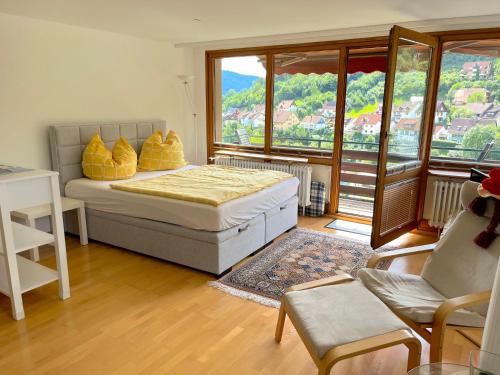 Ένα ή περισσότερα κρεβάτια σε δωμάτιο στο Steiert Panorama Apartments Todtnau