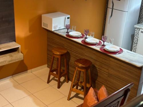 Kuchyň nebo kuchyňský kout v ubytování Duplex Completo e Confortável 400mt da praia