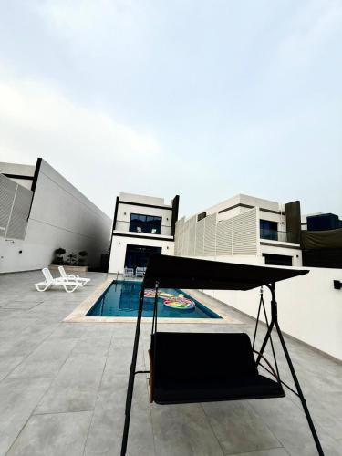 a swimming pool on the roof of a building at Lux 3BR Villa, Sea Views & Pool in Sharm