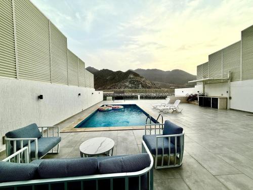 a swimming pool on the roof of a building at Lux 3BR Villa, Sea Views & Pool in Sharm