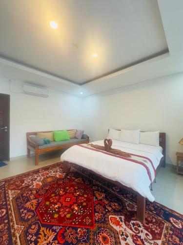 Ένα ή περισσότερα κρεβάτια σε δωμάτιο στο Makati Villa Tulamben