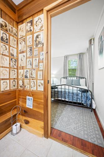 a room with a door leading to a bedroom with a bed at Kentucky Lake Retreat in Dover