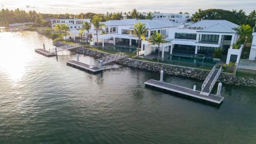 an aerial view of a house next to the water at Trilogy Villas Denarau in Denarau