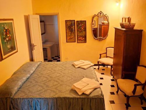 Katil atau katil-katil dalam bilik di Spacious Holiday Home in Radicofani