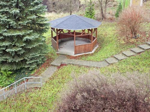 a gazebo in the middle of a garden at Villa in Borstendorf nahe Erzgebirge in Grünhainichen