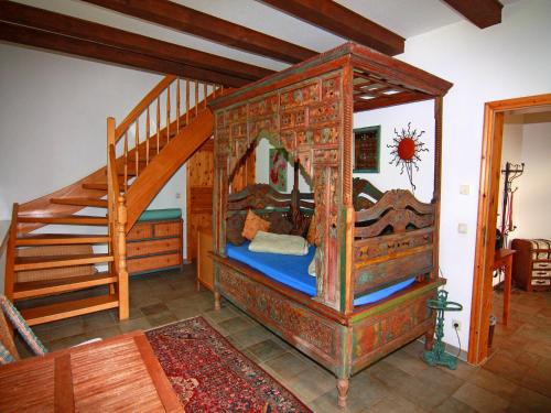 Ένα ή περισσότερα κρεβάτια σε δωμάτιο στο Landhaus in Gressow mit Terrasse