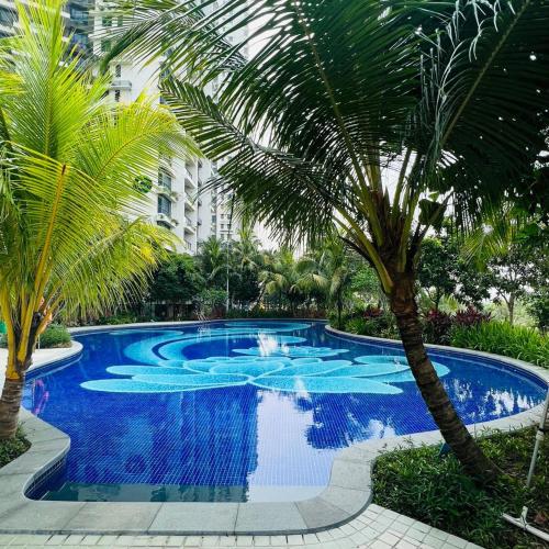 Бассейн в Regalia 2B1R 8pax Condo Forest City GB H-1902 или поблизости