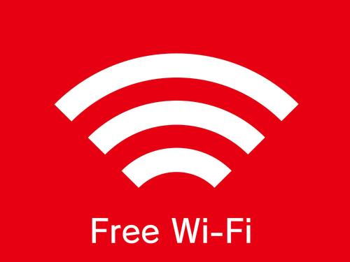 a red symbol with the words free wi fi at HOTEL WiLL EX 大高 レジャーホテル in Nagoya