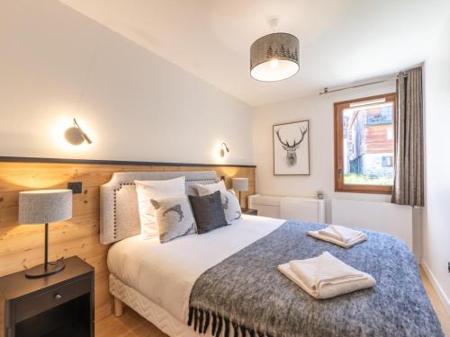 Postel nebo postele na pokoji v ubytování L'Alpe d'Huez - 10 pers, Wifi, Animaux admis - FR-1-645-91