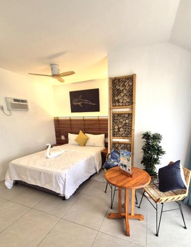 Voodi või voodid majutusasutuse Quo Vadis Dive Resort toas