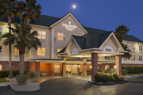 a rendering of the front of a hotel at Country Inn & Suites by Radisson, Tucson Airport, AZ in Tucson